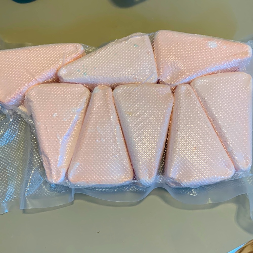 8 pink triangles